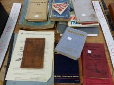 A QUANTITY OF VINTAGE AND VETERAN MOTORING AND VEHICLE CATALOGUES AND MANUELS ECT.