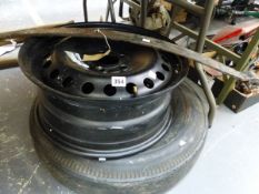 NEW OLD STOCK FORD WHEEL, A FIRESTONE TYRE, AND A JAGUAR MAIN REAR LEAF SPRING 3.4 MRK 2.