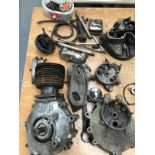 A LARGE COLLECTION OF VINTAGE MOTORCYCLE ENGINE PARTS AND GEAR BOXES INC. VELOCETTE, JAP, LUCAS,