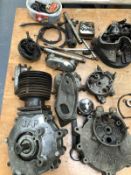 A LARGE COLLECTION OF VINTAGE MOTORCYCLE ENGINE PARTS AND GEAR BOXES INC. VELOCETTE, JAP, LUCAS,