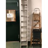 A TRIPLE EXTENSION LADDER.