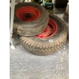 A QUANTITY OF VARIOUS TRAILER AND BARROW WHEELS.