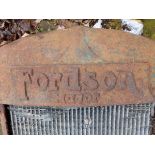 A CAST IRON FORDSON MAJOR RADIATOR AND COWL