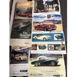 SEVEN VINTAGE AUTOMOBILE ADVERTISING POSTERS