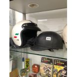 FOUR VINTAGE MOTORCYCLE HELMETS FOR ORNAMENTAL USE ONLY.