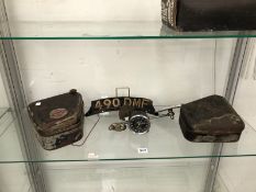 TWO JAMES MOTORCYCLE BATTERY BOXES, A SMITHS MA SPEEDOMETER ETC.