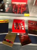 VARIOUS FERRARI MEDIA BOOKS AND CATALOGUE BROCHURES.