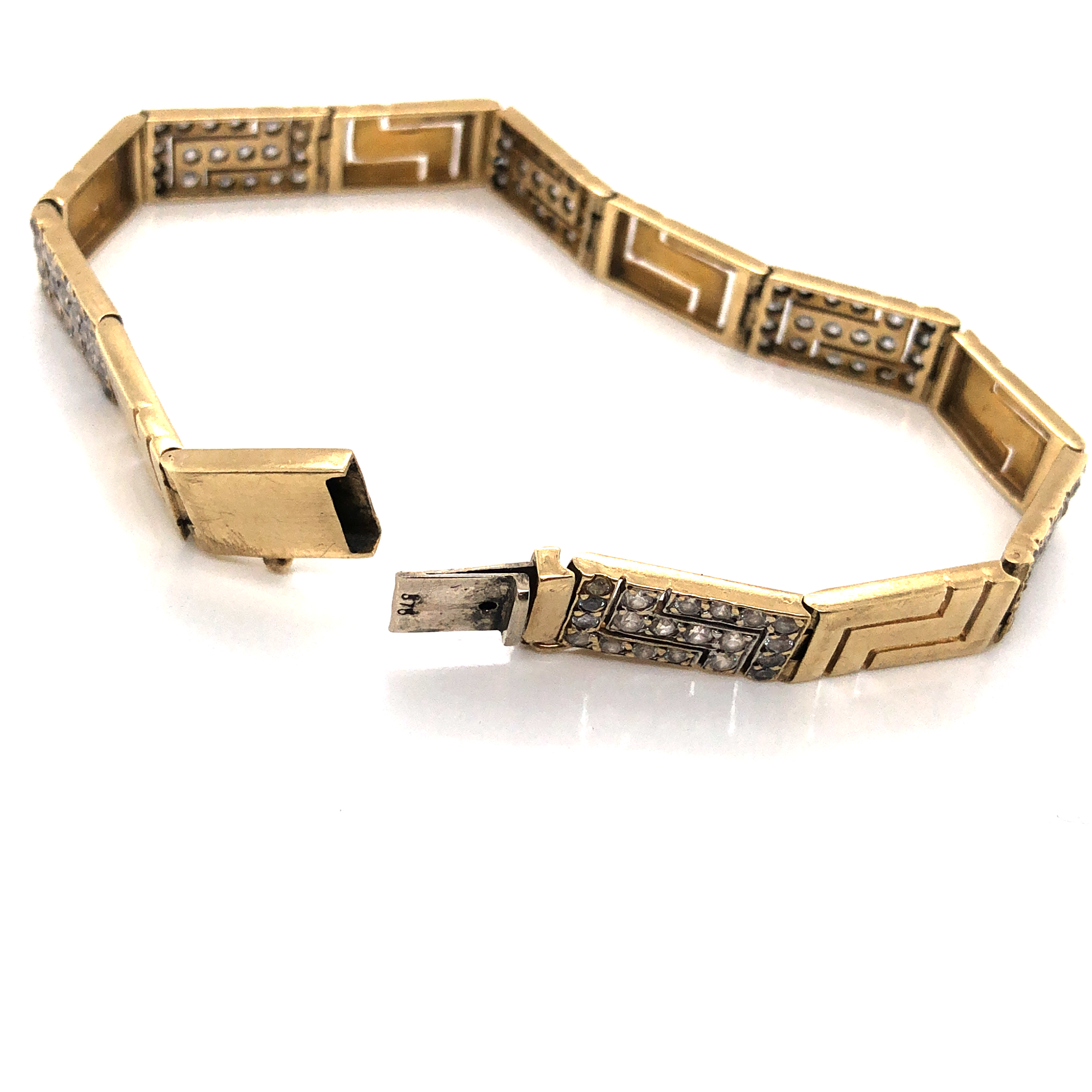 A 9ct HALLMARKED GOLD AND CUBIC ZIRCONIA PANEL BRACELET. SIGNED TOG. LENGTH 20cms. WEIGHT 16.6grms. - Image 2 of 3