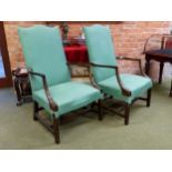 A PAIR OF ANTIQUE MAHOGANY GAINSBOROUGH CHAIRS, THE SERPENTINE TOPPED BACKS AND FRONTED SEATS