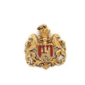 A WATCH FOB CHARM ENAMELLED IN RED ABOUT THE ARMORIAL OF HAMBURG, 585 STAMP, AND ASSESSED AS 14ct.