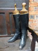 A PAIR OF BLACK LEATHER RIDING BOOTS FITTED WITH TREES BY ALKIT, CAMBRIDGE CIRCUS, LONDON