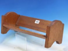 A HARDWOOD TABLE TOP BOOK TROUGH. W 38cms.