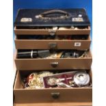 A LARGE QUANTITY OF VINTAGE AND OTHER COSTUME JEWELLERY, PLATED WARE AND WATCHES CONTAINED WITHIN