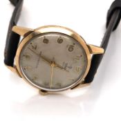 A GENTS VINTAGE 9ct GOLD TUDOR ROYAL SHOCK-RESISTING, MANUAL WOUND WRIST WATCH ON A BROWN LEATHER