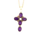 A 9ct GOLD AMETHYST AND PEARL CROSS SUSPENDED ON A 9ct GOLD CURB CHAIN. CROSS MEASUREMENTS 3.5 X 2.