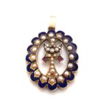AN ANTIQUE BLUE ENAMEL, SEED PEARL AND RUBY PENDANT. UNHALLMARKED AND ASSESSED AS 15ct GOLD.