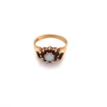 A VINTAGE HALLMARKED 9ct YELLOW GOLD, OPAL AND GARNET CLUSTER RING. FINGER SIZE M 1/2. WEIGHT 2.
