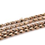A VINTAGE TULIP STYLE CHAIN, UNHALLMARKED AND ASSESSED AS 9ct GOLD. LENGTH 78cms. WEIGHT 14.7grms.