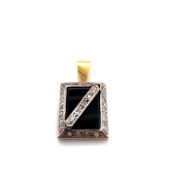 A DIAMOND AND ONYX PENDANT SET IN UNHALLMARKED WHITE AND YELLOW ASSESSED AS 18ct GOLD.