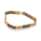 A 9ct HALLMARKED GOLD AND CUBIC ZIRCONIA PANEL BRACELET. SIGNED TOG. LENGTH 20cms. WEIGHT 16.6grms.