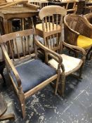 A 19th C. BLEACHED MAHOGANY ELBOW CHAIR TOGETHER WITH A PINE ROCKING CHAIR