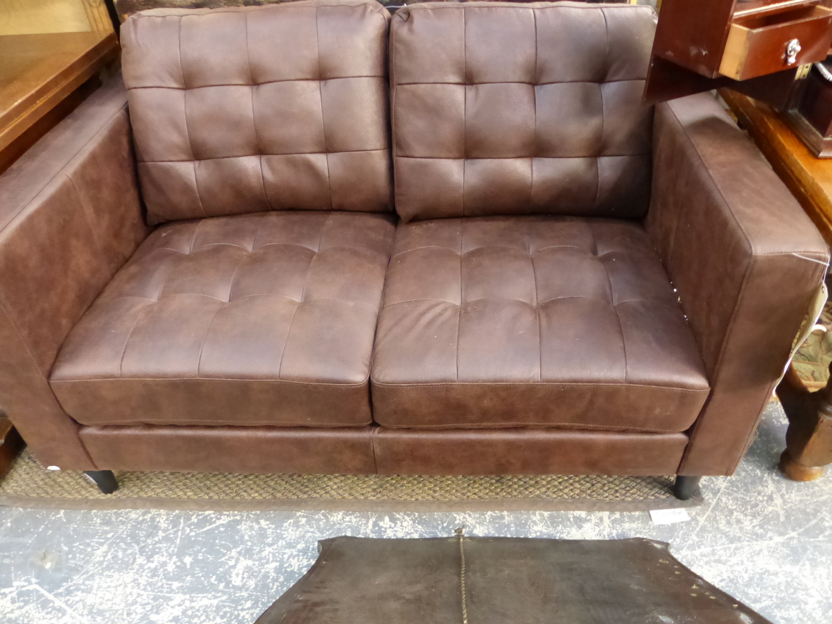 AN AS NEW UNUSED LEATHERETTE UPHOLSTERED TWO SEAT SETTEEE
