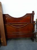 A VICTORIAN MAHOGANY DOUBLE BED.