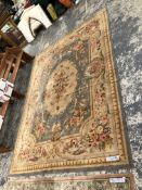 A MACHINE MADE CARPET OF AUBUSSON DESIGN 365 x 270 cms