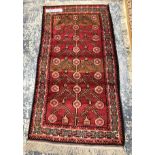 A TURKISH TRIBAL RUG 154 x 82 cms