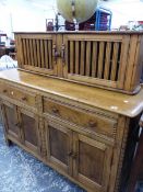 A VINTAGE OAK SIDE BOARD WITH HUTCH BACK.