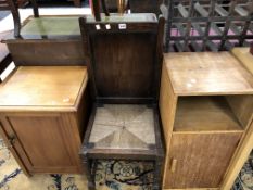 TWO OAK BEDSIDE CUPBOARDS TOGETHER WITH A RUSH SEATED CHAIR