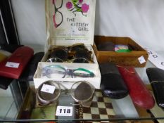 A COLLECTION OF SPECTACLES, CASES AND DARK GLASSES
