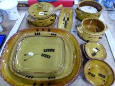 A PART SERVICE OF WHEAT DECORATED CONTINENTAL SLIP WARE POTTERY TOGETHER WITH COWRIE SHELL PLACE