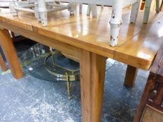 A MODERN OAK DRAWER LEAF TABLE.