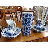 TWO BLUE AND WHITE JUG AND BOWL SETS AND A STICK STAND.