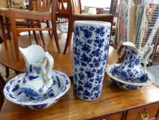 TWO BLUE AND WHITE JUG AND BOWL SETS AND A STICK STAND.