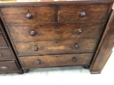 A VICTORIAN MAHOGANY CHEST OF TWO SHORT AND THREE GRADED LONG DRAWERS ON SPINDLE FEET. W 100 x D