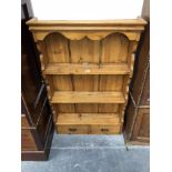 A 20th C. PINE DRESSER BACK WITH THREE SHELF ENCLOSED BACK ABOVE TWO DRAWERS. W 66 x D 17 x H