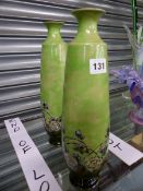 A PAIR OF GREEN GROUND DOULTON STONE WARE VASES DESIGNED BY ELIZA SIMMANCE. H 33cms.