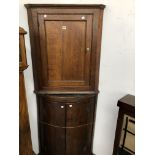 A GEORGE III OAK BOW FRONT CORNER CUPBOARD TOGETHER WITH ANOTHER FLAT FRONTED