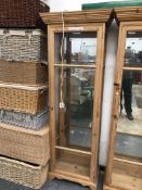 A PINE FRAMED GLAZED DISPLAY CABINET