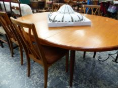 A G PLAN TEAK DINING TABLE AND FOUR SIMILAR CHAIRS.