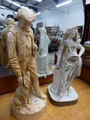 A LARGE PORCELAIN FIGURINE, A SPORTSMAN AND HIS DOG IN THE MANNER OF ROYAL DUX, AND A PAINTED BISQUE