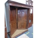 A GEORGE III MAHOGANY TWO DRAWER WARDROBE.