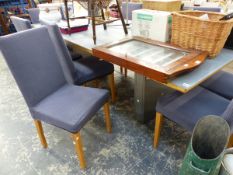 A VERY LARGE GLASS TOPPED DINING TABLE AND TEN DINING CHAIRS.