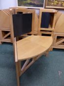 A SET OF SIX ART DECO INSPIRED FOLDING CHAIRS.