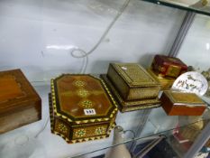 THREE MIDDLE EASTERN PARQUETRIED JEWELLERY BOXES, A MUSICAL CIGARETTE BOX TWO OTHER BOXES AND A