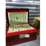 A LEATHER CASED MAHJONG SET