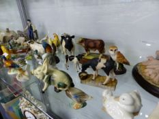 A COLLECTION OF CERAMIC ANIMAL AND BIRD FIGURES
