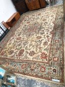 AN ORIENTAL CARPET OF OUSHAK DESIGN 546 x 377 cms